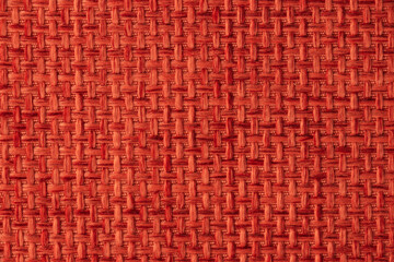 Red swatch. Textiles and wool. Blank background and close-up.