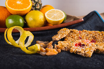 Rich and colorful cereal bars with citrus fruits - Cereal bars for a healthy diet.