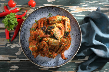 granchio in salsa di pomodoro