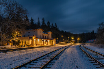 Fototapeta na wymiar Winter snowy railway station Jedlova in the middle of Luzicke hory