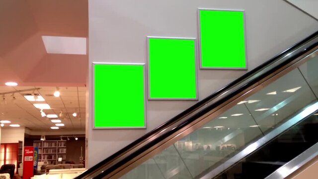 Green billboard for your ad inside Coquitlam Center shopping mall in Coquitlam BC Canada.