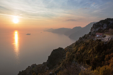 Panorama view of the Amalfi coast seen from the path of the gods at sunset, Campania, Southern Italy.