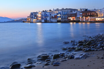Obraz premium Blue hour at Mykonos island. The houses at the background is the district called Little Venice, for obvious reasons. Mykonos island, Greece, Europe