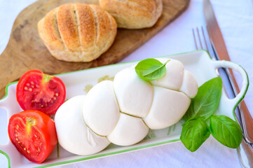 Fresh soft white italian cheese braid mozzarella buffalo made from Italian buffalo's milk by pasta filata method