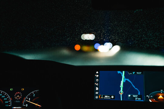 GPS Navigator In Car Driving In Night