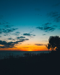 Naklejka premium beautiful sunrise at a tropical beach