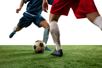 Attack. Close up legs of professional soccer, football players fighting for ball on field isolated on white background. Concept of action, motion, high tensioned emotion during game. Cropped image.