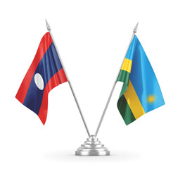 Rwanda and Laos table flags isolated on white 3D rendering.