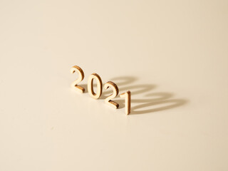 2021/2020 - shadow of the previous year, new year, wooden numbers