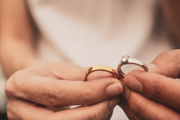 Close up hand holding wedding ring concept Couple love in Valentine