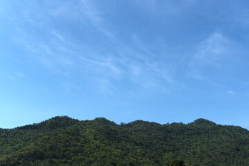 Landscape of the national park near the dam with mountains over the blue sky with clouds, in natural rural area holiday concept