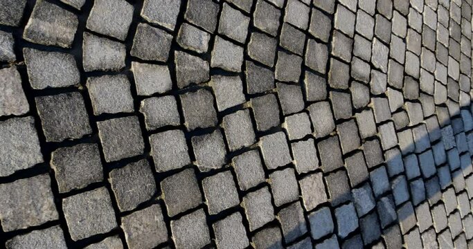 Stony floor details with granite cube