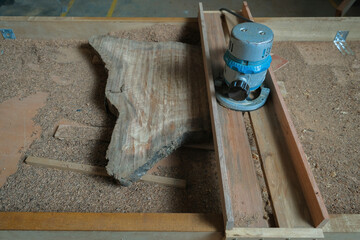 Portable router machine  with  slab coffee table. Woodworking and carpentry production .Furniture...