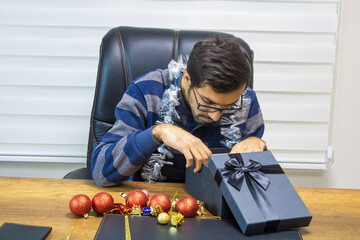 A person celebrating New Year alone, a businessman celebrating New Year alone, a person celebrating the new year.