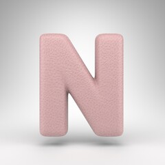Letter N uppercase on white background. Pink leather 3D letter with skin texture.