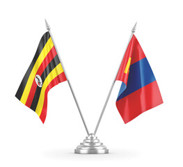 Mongolia and Uganda table flags isolated on white 3D rendering