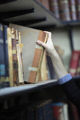 hand holding a book