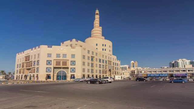 Qatar Islamic Cultural Centre timelapse hyperlapse in Doha, Qatar, Middle-East. Traffic on the road. Blue sky at sunny day