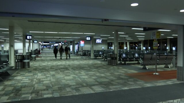 airport boarding gate people waiting for their flight