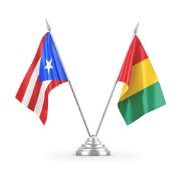 Guinea and Puerto Rico table flags isolated on white 3D rendering