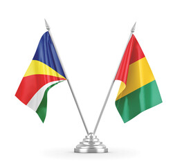 Guinea and Seychelles table flags isolated on white 3D rendering