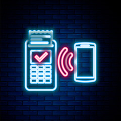 Glowing neon line POS terminal with printed reciept and confirms the payment by smartphone icon isolated on brick wall background. NFC payment concept. Colorful outline concept. Vector.