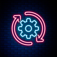 Glowing neon line Gear and arrows as workflow concept icon isolated on brick wall background. Gear reload sign. Colorful outline concept. Vector.