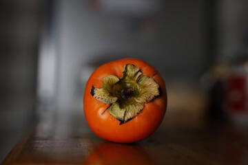 juicy persimmon close-up on the table