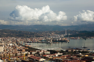 Fototapeta na wymiar Panorama view of La Spezia port, one of the largest commercial ports of Liguria, located in the northernmost part of the Gulf of La Spezia, Italy, Europe.