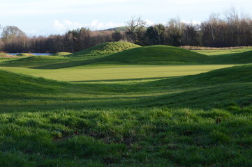 Fototapeta na wymiar Views across golf courses at Craigtoun, near St Andrews, Fife on a sunny mid December day