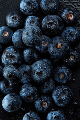 Fresh natural antioxidant blueberries pile, macro detailed close up
