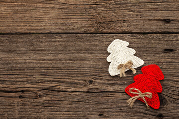 Valentine's Day or Happy New Year concept with crochet fir trees