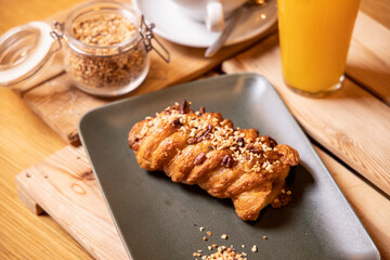 breakfast with brioches, chocolate,  cappuccino and fresh squeezed orange juice