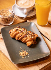 breakfast with brioches, chocolate,  cappuccino and fresh squeezed orange juice