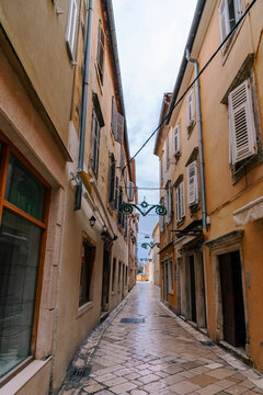 Fototapeta Narrow street of old town of Zadar, Croatia.