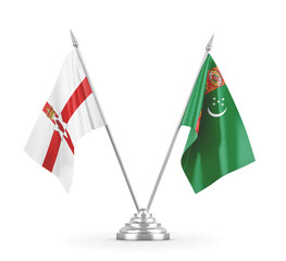 Turkmenistan and Northern Ireland table flags isolated on white 3D rendering