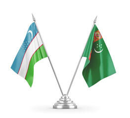 Turkmenistan and Uzbekistan table flags isolated on white 3D rendering