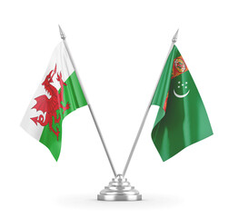 Turkmenistan and Wales table flags isolated on white 3D rendering