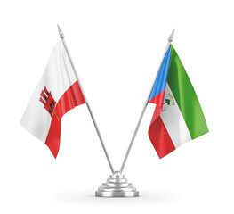 Equatorial Guinea and Gibraltar table flags isolated on white 3D rendering