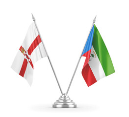 Equatorial Guinea and Northern Ireland table flags isolated on white