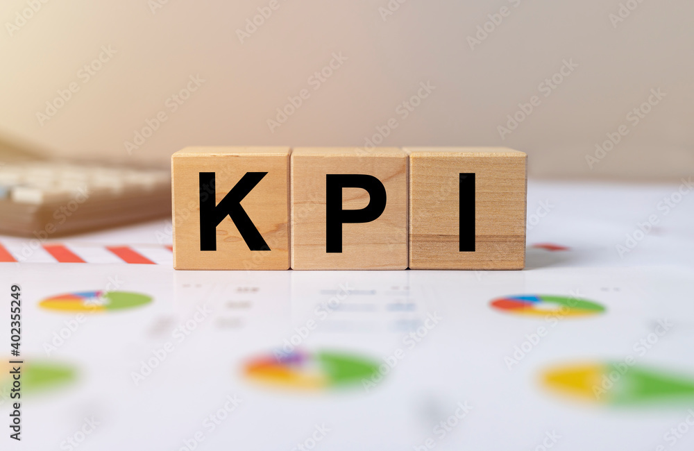 Poster kpi word on cubes. key performance indicator