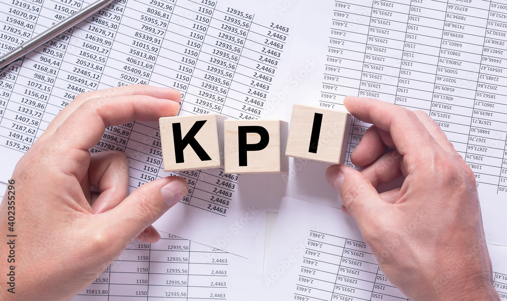 Poster kpi word on cubes. key performance indicator
