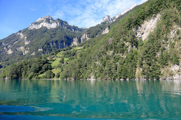 Large mountains range on the lake in Switzerland