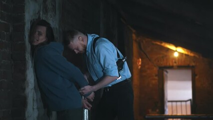 Police officer catching and arresting young man drug trafficker