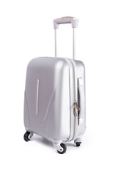 Travel suitcase isolated. Silver plastic luggage or vacation baggage bag on white background. Design of summer vacation holiday concept.