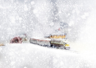 Travelling By Rail: 1950s Locomotive and Passenger Cars in Winter Snow (N-Scale Model railroad vignette)