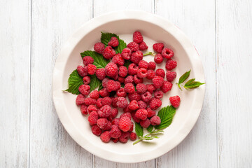 Overhead view of baking dish with raspberry, summer pie concept