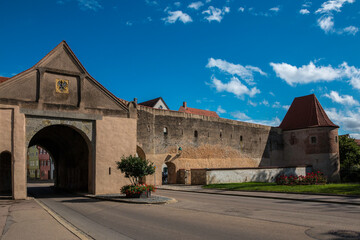 Fototapeta na wymiar Big city gate through the big medieval city wall