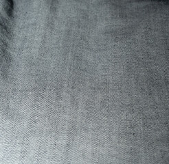 Fototapeta na wymiar The texture of the underside of jeans. Denim closeup.
