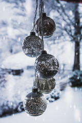 Naklejka na ściany i meble christmas tree balls against a background with snow
